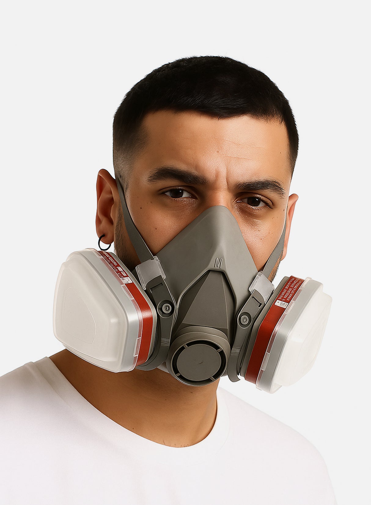 Person wearing a gray and white respirator mask on a white background